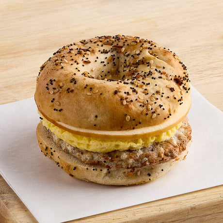 Grand Prairie Spicy Sausage, Egg, and Gouda Everything Bagel Sandwich 5.2 oz. - 24/Case
