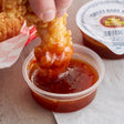 Sweet Baby Ray's Sweet Red Chili Wing Sauce and Glaze Dipping Cup 2 oz. - 72/Case