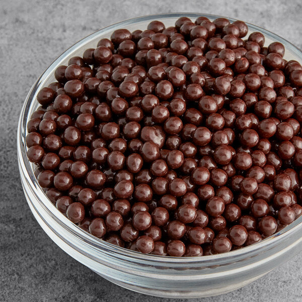 Valrhona 55% Dark Chocolate Crunchy Pearls 6.6 lb. - 3/Case