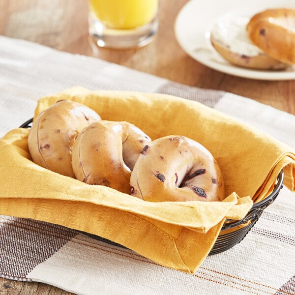 Original Bagels Tribute Baking Company New York Style Pre-Sliced Blueberry Mini Bagel 2 oz. - 144/Case