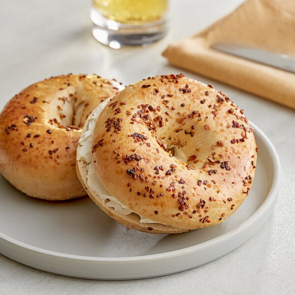 Just Bagels Authentic New York Garlic Bagel 4 oz. - 48/Case