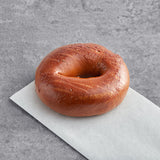 Just Bagels Authentic New York Pumpernickel Bagel 4 oz. - 48/Case