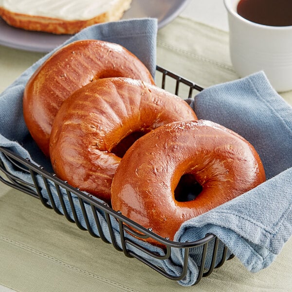 Just Bagels Authentic New York Pumpernickel Bagel 4 oz. - 48/Case