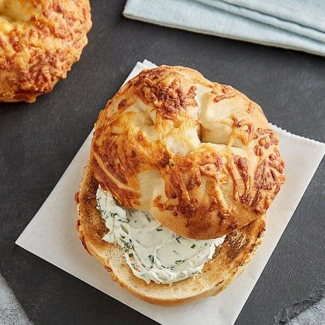 Original Bagels Tribute Baking Company New York Style Asiago Cheese Bagel 4 oz. - 90/Case