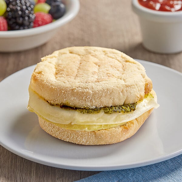 Clara's Kitchen Pesto and Provolone Breakfast Sandwich 4 oz. - 12/Case