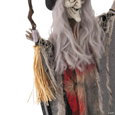 RADYAN Hanging Witch Halloween Decoration with Hat, Broom, and Cloak shown in a clear product image