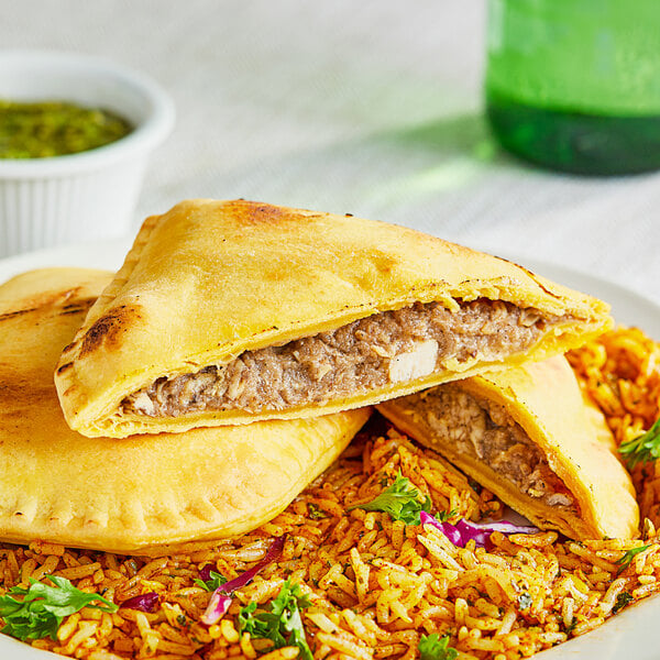 Caribbean Food Delights Unbaked Jerk Chicken Patty 5 oz. - 50/Case