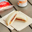 Smucker's Uncrustables Strawberry Jam and Peanut Butter Sandwich 2 oz. - 60/Case