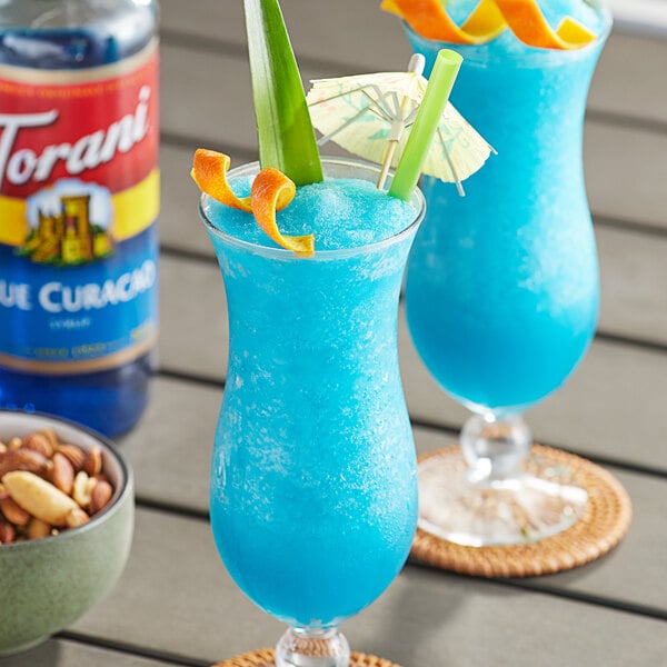 Torani Blue Curacao Flavoring Syrup 750 mL Glass Bottle - 12/Case