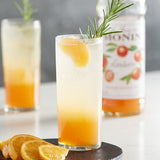 Monin Premium Mandarin Flavoring / Fruit Syrup 750 mL - 12/Case
