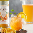 Monin Premium Orange Flavoring / Fruit Syrup 750 mL - 12/Case
