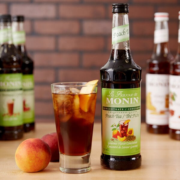Monin 750 mL Peach Tea 7:1 Concentrate - 12/Case