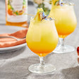 Monin Premium Hawaiian Island Flavoring / Fruit Syrup 1 Liter - 4/Case