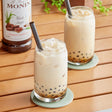 Monin Premium Black Sugar Flavoring Syrup 1 Liter - 4/Case