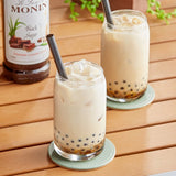 Monin Premium Black Sugar Flavoring Syrup 1 Liter - 4/Case