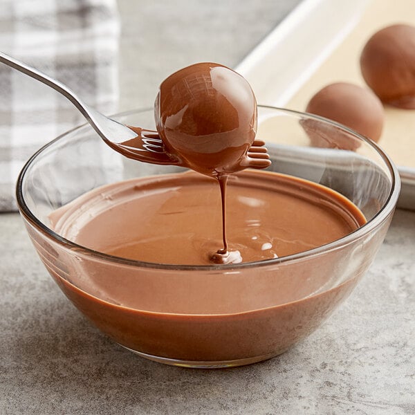 Callebaut Recipe 823 Milk Chocolate Callets™ 5.5 lb. - 8/Case