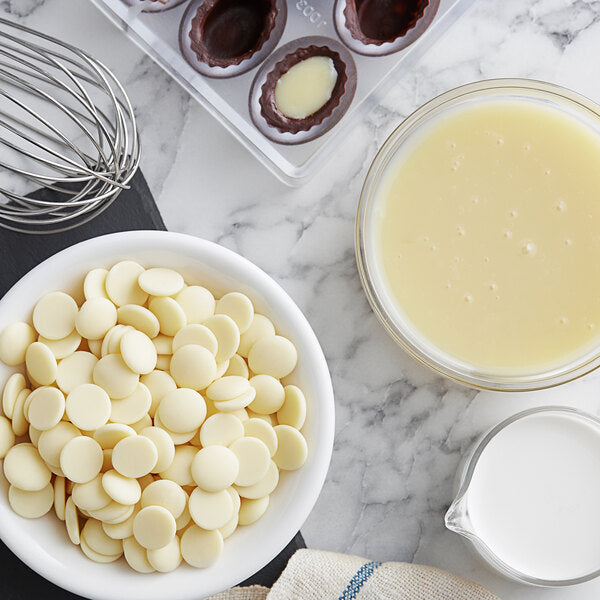 Cacao Barry Heritage Blanc Satin White Chocolate Pistoles 11 lb. - 4/Case