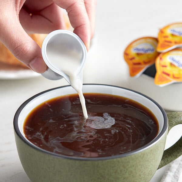 International Delight Caramel Macchiato Single Serve Non-Dairy Creamer - 144/Case