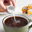 International Delight Caramel Macchiato Single Serve Non-Dairy Creamer - 144/Case