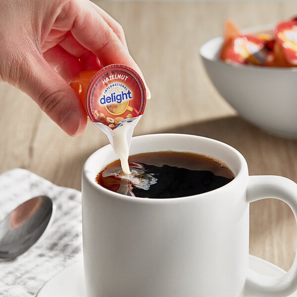 International Delight Hazelnut Single Serve Non-Dairy Creamer - 144/Case