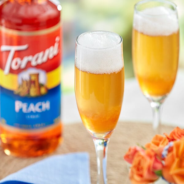 Torani Peach Flavoring / Fruit Syrup 750 mL Glass Bottle - 12/Case