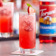 Torani Strawberry Flavoring / Fruit Syrup 750 mL Glass Bottle - 12/Case