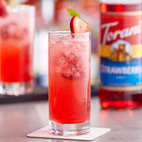 Torani Strawberry Flavoring / Fruit Syrup 750 mL Glass Bottle - 12/Case