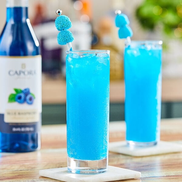 Capora Blue Raspberry Flavoring Syrup 750 mL - 6/Case