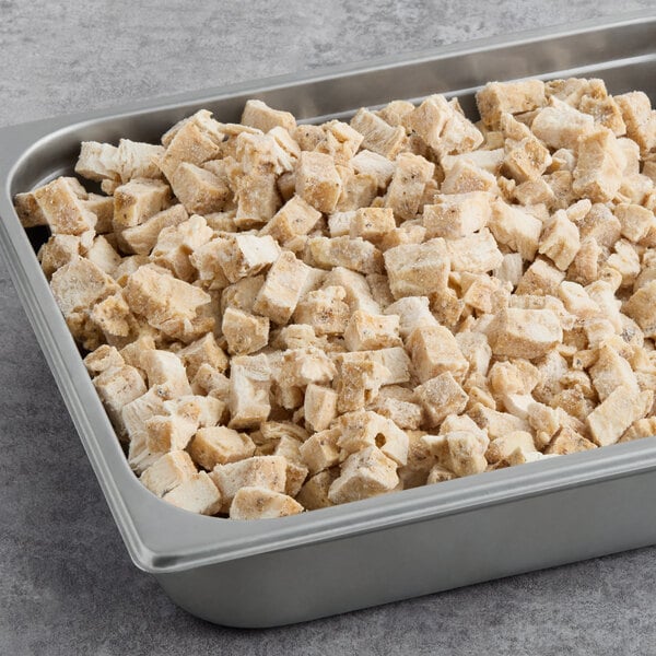 Brakebush Chik'N'Zips 1/2" Diced Fully Cooked Fajita Chicken Breast Meat 5 lb. Bag - 2/Case