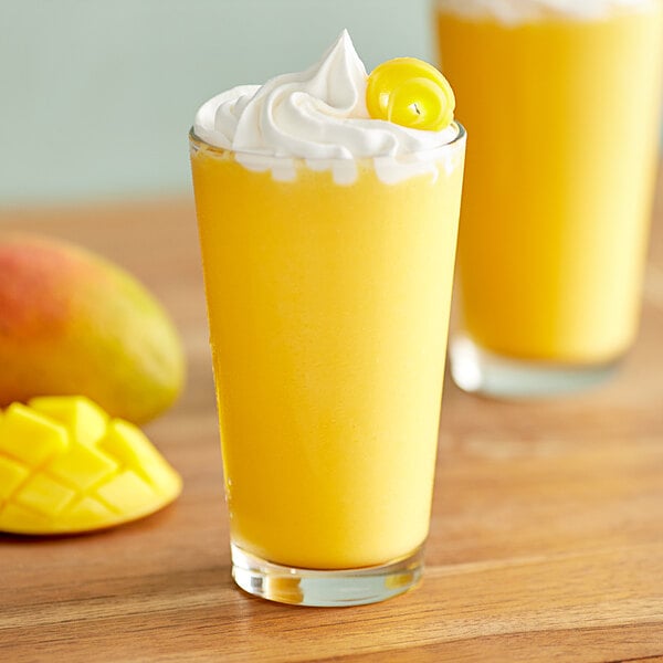 Big Train 3.5 lb. Dragonfly Mango Blended Creme Frappe Mix - 5/Case