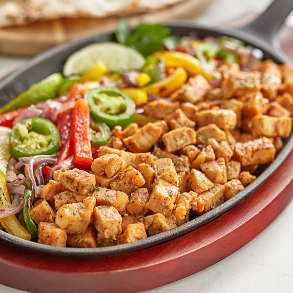 Brakebush Chik'N'Zips 1/2" Diced Fully Cooked Fajita Chicken Breast Meat 5 lb. Bag - 2/Case