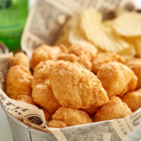 Brakebush Tappers 3 oz. Fully Cooked Beer Battered Boneless Wings - 53/Case