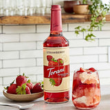 Torani Puremade Strawberry Flavoring Syrup 750 mL Glass Bottle - 4/Case