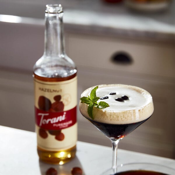 Torani Puremade Hazelnut Flavoring Syrup 750 mL Glass Bottle - 4/Case