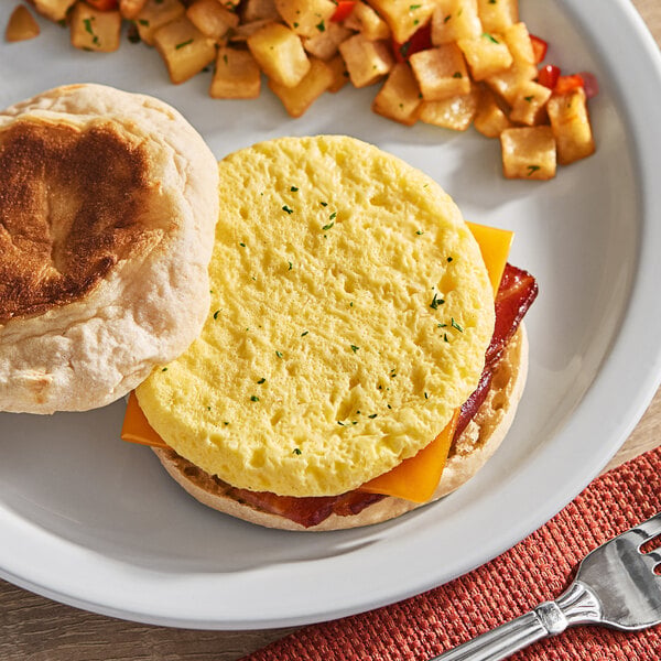 Papetti's 3 1/2" Round Fully Cooked Scrambled Egg Patty 1.5 oz. - 160/Case
