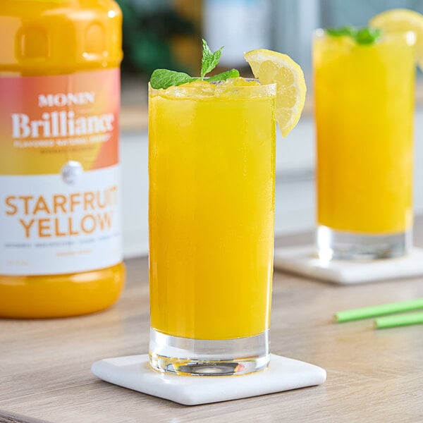 Monin Brilliance Starfruit Yellow Natural 5:1 Energy Concentrate 64 fl. oz. - 4/Case