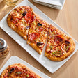 Rich's 12" x 5" Par-Baked Oval Flatbread Crust - 48/Case