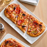 Rich's 12" x 5" Par-Baked Oval Flatbread Crust - 48/Case