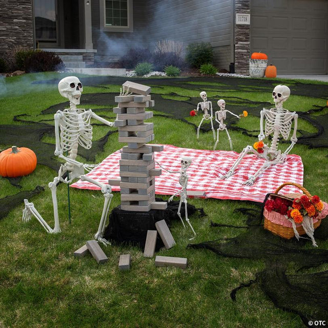2 Ft. - 5 Ft. Posable Plastic Skeleton Family Halloween Decorating Kit - 5 Pc.