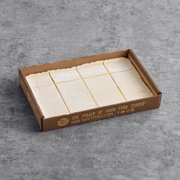Sweet Street Desserts 2.87 oz. Pre-Cut Lemon Bar Squares 16-Count Tray - 4/Case