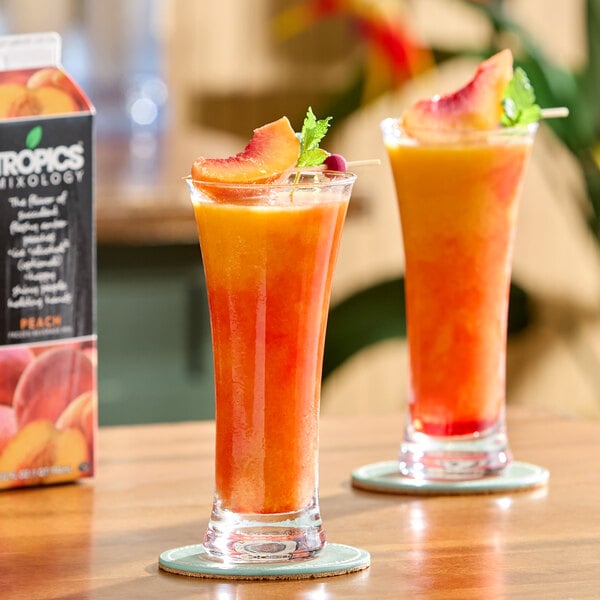 Tropics Mixology Peach Frozen Beverage Mix 32 fl. oz. - 12/Case