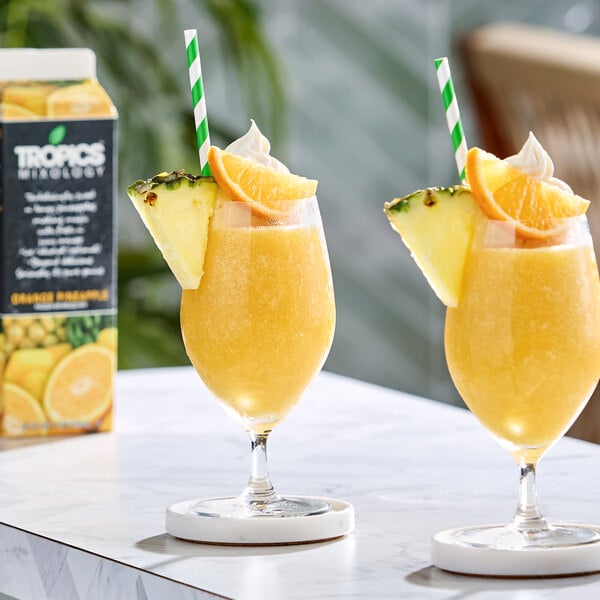 Tropics Mixology Orange Pineapple Frozen Beverage Mix 32 fl. oz. - 12/Case