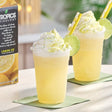Tropics Mixology Lemon Ice Frozen Beverage Mix 32 fl. oz. - 12/Case