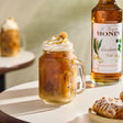 Monin Premium Macadamia Nut Flavoring Syrup 750 mL - 12/Case