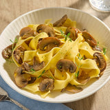 Phillips Gourmet Mushrooms IQF Seasoned Sauteed Roasted Sliced Wild Mushroom Blend 2 lb. - 8/Case