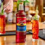 Torani Pomegranate Flavoring / Fruit Syrup Plastic Bottle 1 Liter - 6/Case