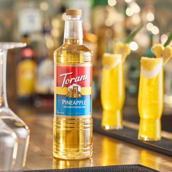Torani Pineapple Flavoring / Fruit Syrup Plastic Bottle 1 Liter - 6/Case