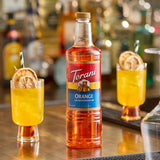 Torani Orange Flavoring / Fruit Syrup Plastic Bottle 1 Liter - 6/Case