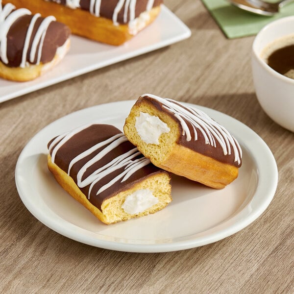 Talerico Chocolate Iced Buttercreme-Filled Long John Donut 5.2 oz. - 20/Case