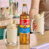 Torani Creme de Banana Flavoring / Fruit Syrup Plastic Bottle 1 Liter - 6/Case